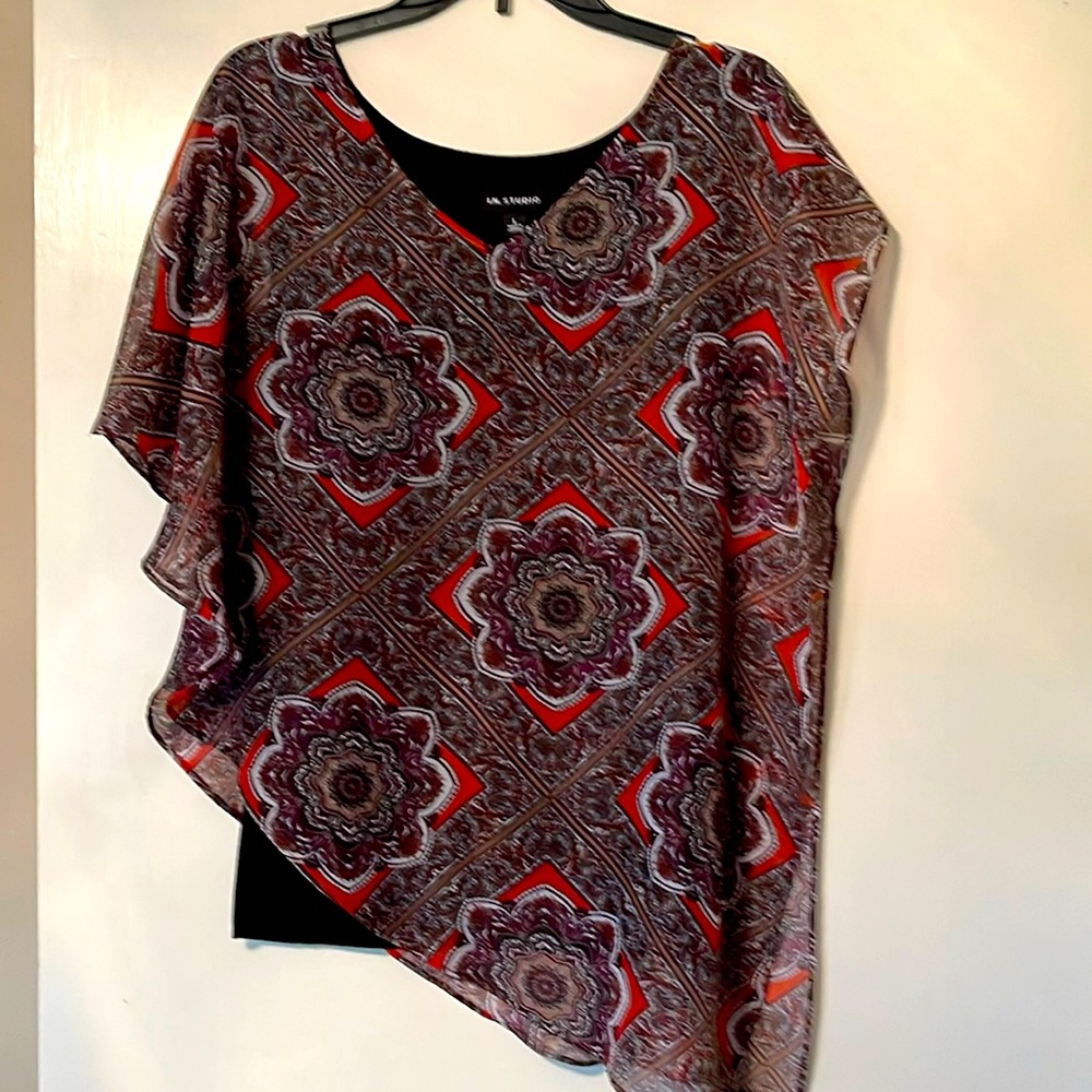 Great flowy top that is a tank with attached print (black/gray/red) poncho. Sz L